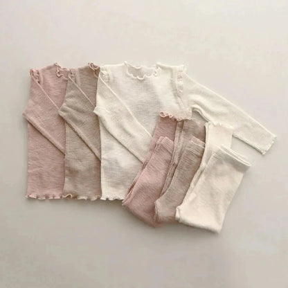 Shop the Babylove Spring Sleepwear Set at BubeBaby, featuring cozy cotton pajamas perfect for spring and autumn. Available for ages 7-12 months to 4-6 years, this unisex set includes a round-neck top and pants with a casual, printed design. Fits true to size with full sleeves and broadcloth fabric. Ideal for comfortable, stylish sleepwear