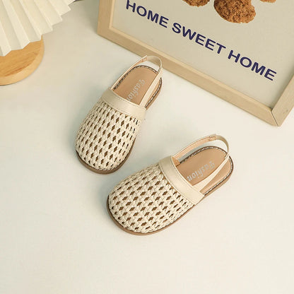 Discover BabyLove Woven Slip-On Sandals at BubeBaby, perfect for summer. These breathable sandals feature cut-outs and a soft leather style with a flat heel. Available in sizes from 14.5cm to 21.5cm, they fit true to size and offer a comfortable, stylish option for ages 4-6Y. Use our size guide for the perfect fit