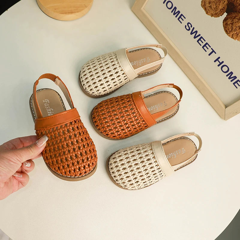 Discover BabyLove Woven Slip-On Sandals at BubeBaby, perfect for summer. These breathable sandals feature cut-outs and a soft leather style with a flat heel. Available in sizes from 14.5cm to 21.5cm, they fit true to size and offer a comfortable, stylish option for ages 4-6Y. Use our size guide for the perfect fit