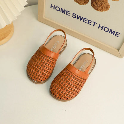 Discover BabyLove Woven Slip-On Sandals at BubeBaby, perfect for summer. These breathable sandals feature cut-outs and a soft leather style with a flat heel. Available in sizes from 14.5cm to 21.5cm, they fit true to size and offer a comfortable, stylish option for ages 4-6Y. Use our size guide for the perfect fit