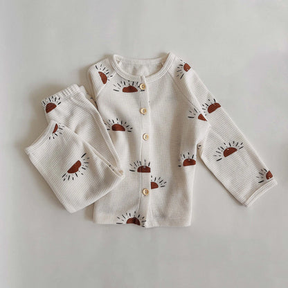 Bubebaby BabyLove toddler pajamas made from soft cotton fabric. The sleepwear set includes a top and pants with a comfortable, snug fit. The design features playful patterns or colors, making it both cozy and cute for bedtime