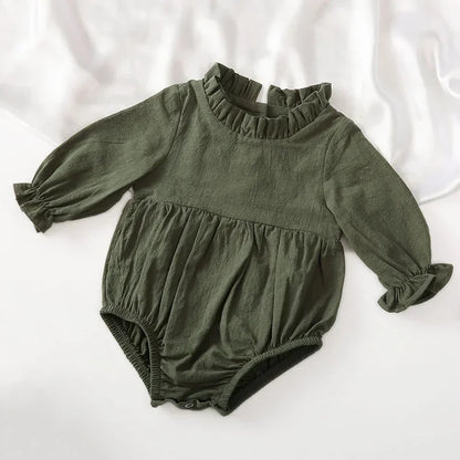 Bubebaby BabyLove Cotton Ruffled Long Sleeve buttoned Romper.  A cute and cozy baby romper made from soft cotton fabric, featuring long sleeves, a ruffled collar and wrists, with a snap closure for easy dressing. 